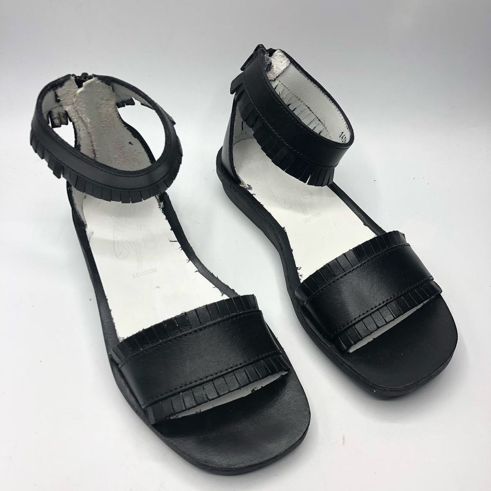 Fly London Black Fringed Ankle-Strap Sandals